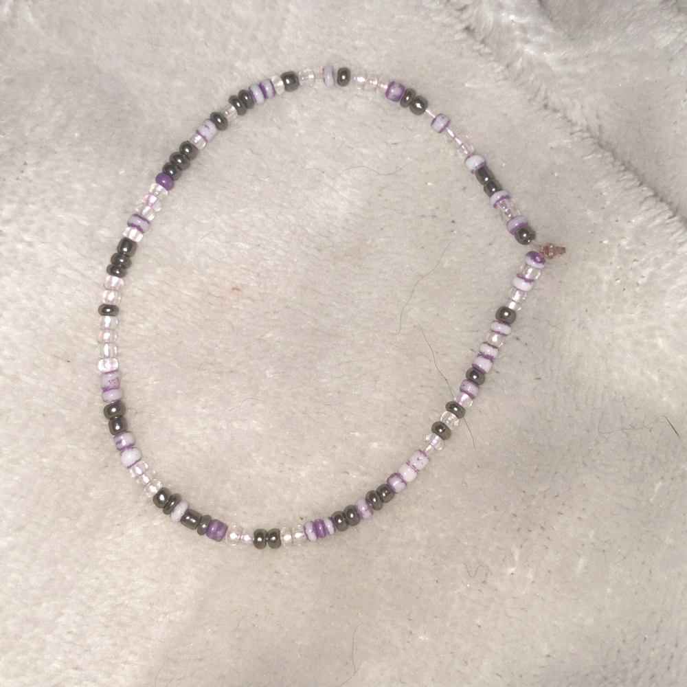 Purple and white bracelet